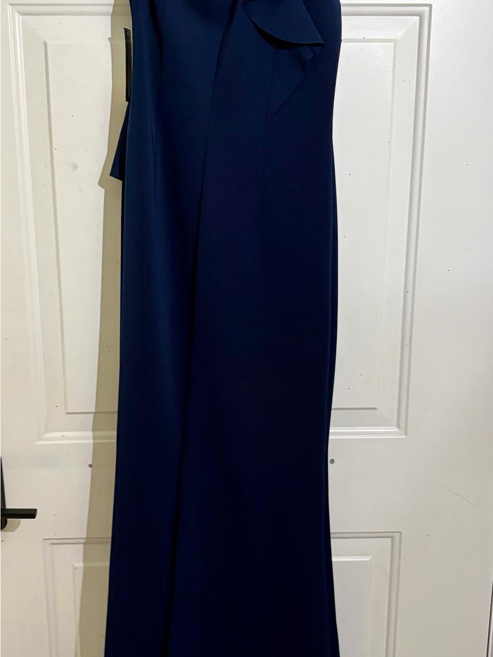 Elegant Navy one-shoulder formal gown with ruffle detail.